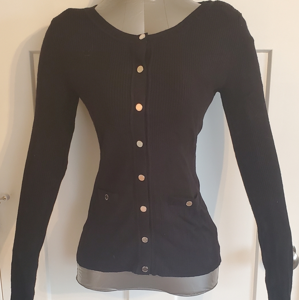 Black snap-up sweater